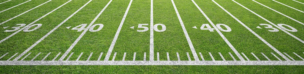 Charter bus and shuttle rentals for football teams.